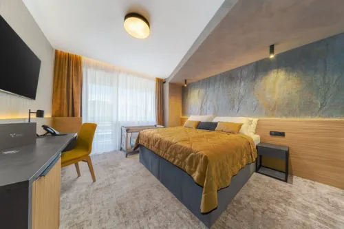 Posteľ v business apartmáne